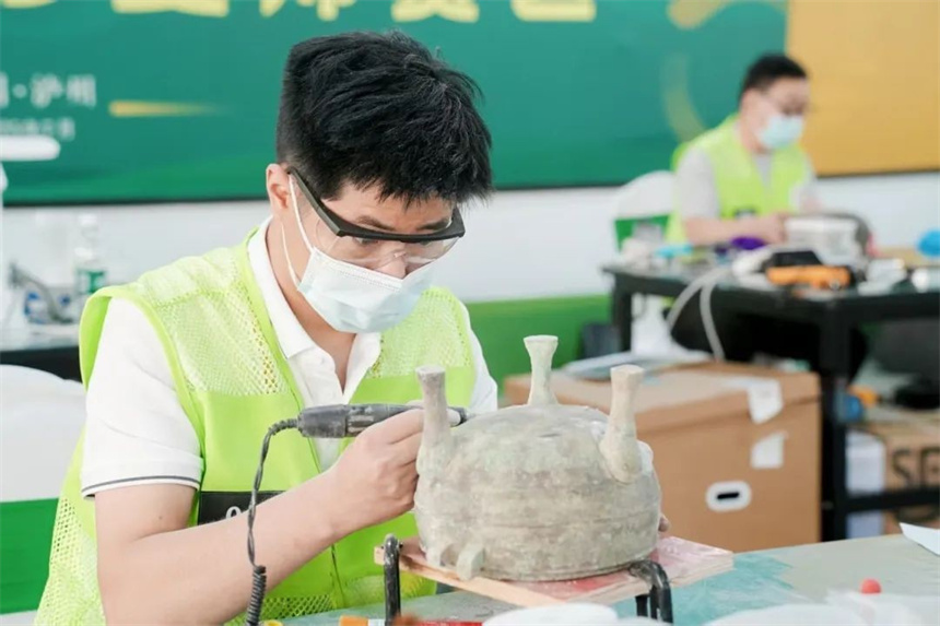 湖北省文物考古研究院周明比賽中。