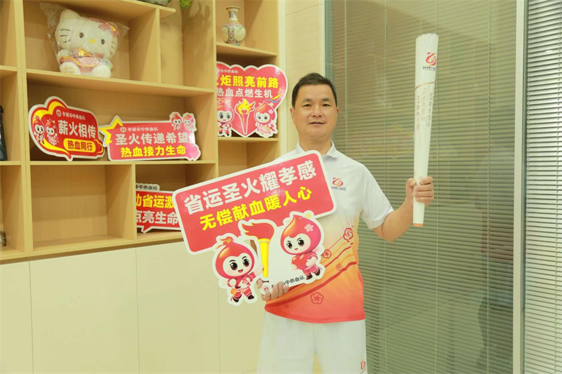 火炬手劉明旺。
